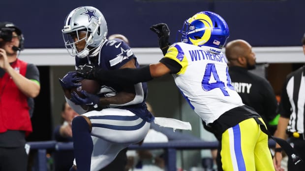 Dallas Cowboys wide receiver Brandin Cooks (3) makes a touchdown catch past Los Angeles Rams cornerback Ahkello Witherspoon (44) during the fourth quarter at AT&T Stadium.